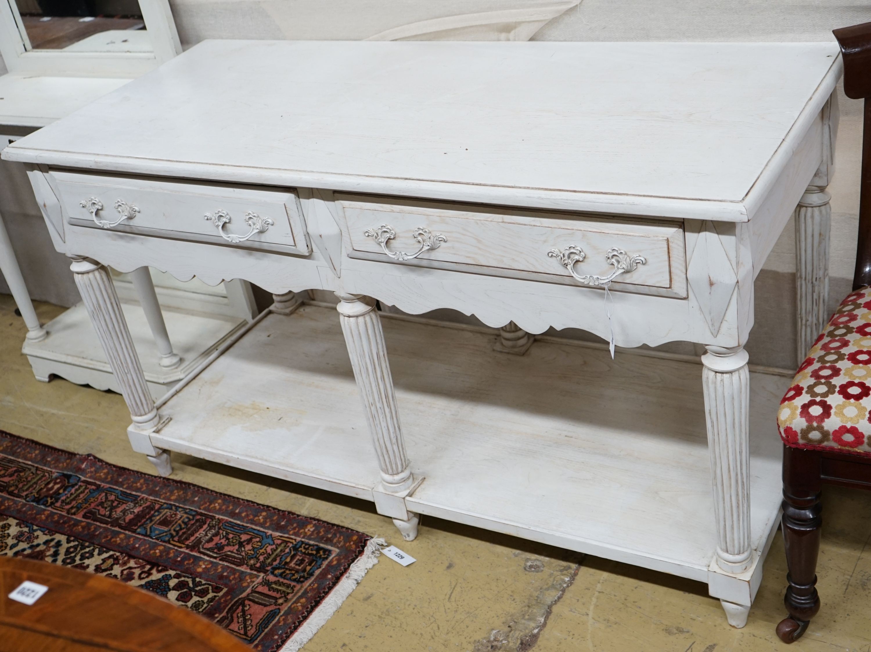 A Victorian style limed oak two drawer console table, width 140cm, depth 60cm, height 80cm